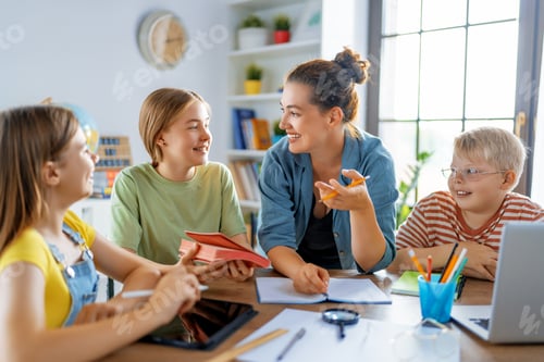 Preview: Happy kids and teacher at school