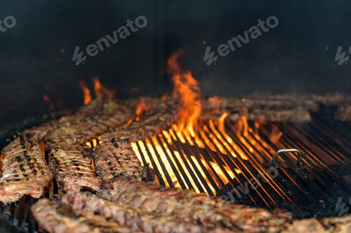 Preview: american bbq ribs cooking on grill