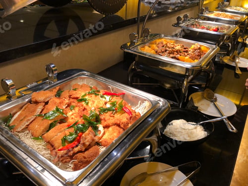 Preview: Seafood and meat dishes on buffet display
