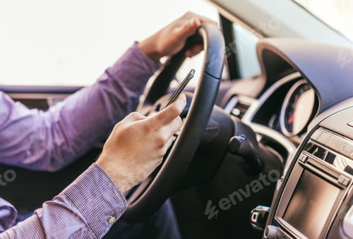 Preview: Close-up of a male hand in a modern car
