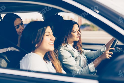 Preview: Girls friends traveling by car