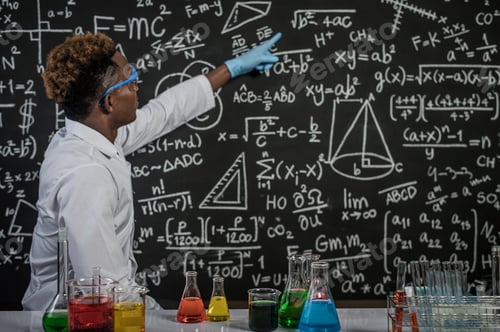 Preview: Scientists wear glasses and point to formulas on the blackboard in the laboratory.
