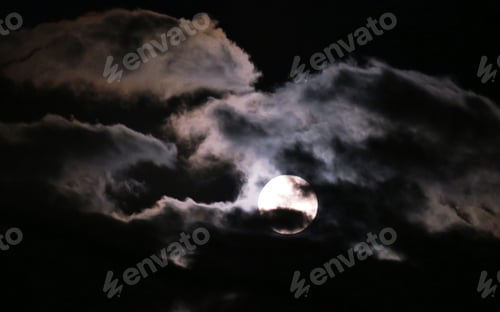 Preview: Beautiful moonlight and cloudy night sky blur nature background