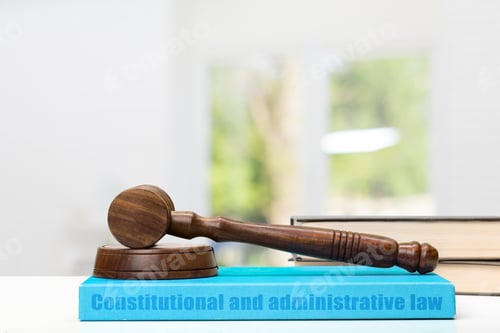 Preview: Wooden gavel and books on wooden table