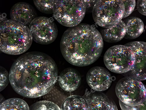Preview: Vibrant closeup of colorful disco balls.