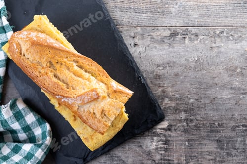 Preview: Spanish potato omelette sandwich on wooden table