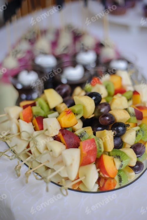 Preview: Delicious Fruit Skewers and Desserts Arrangement