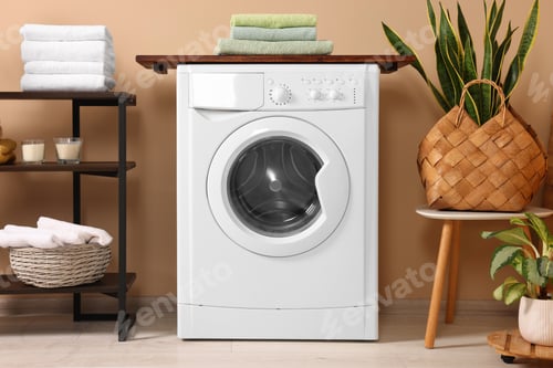 Preview: Stylish laundry room with modern washing machine. Interior design