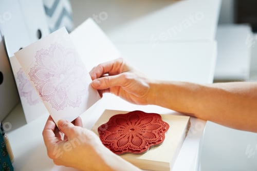 Preview: Practice makes perfect. Cropped shot of a womans hands holding a hand-crafted card.