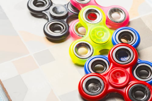 Preview: fidget SPINNER stress relieving toy on stone background