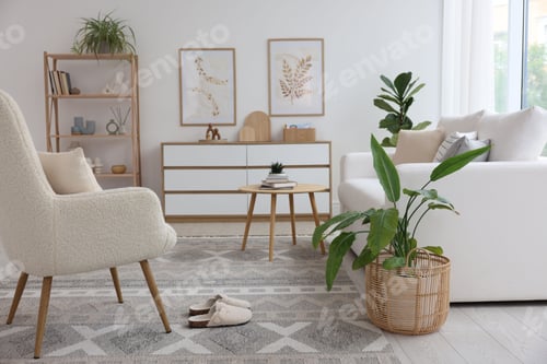 Preview: Stylish sofa and other furniture in living room. Interior design