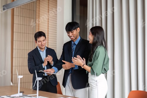 Preview: ESG sustainability celebration of project success in modern office