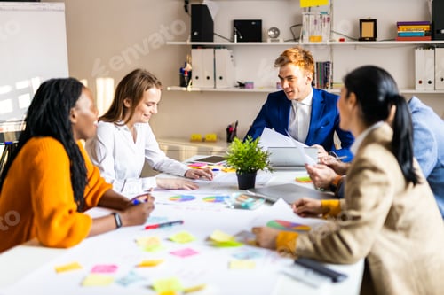 Preview: Business team working in a start-up office