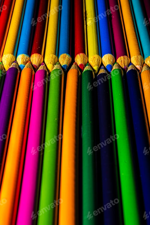 Preview: Color pencils against a black background.