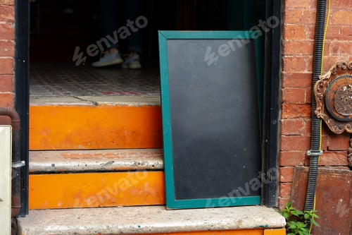 Preview: Wooden signboard for cafe on a street