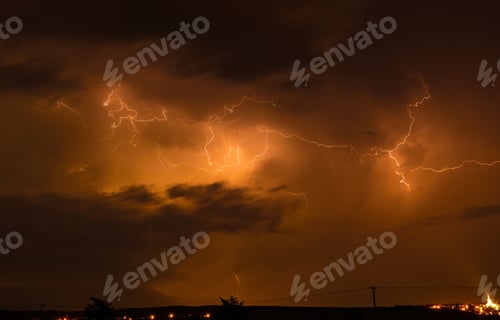 Preview: Lightning storm over cityscape at night