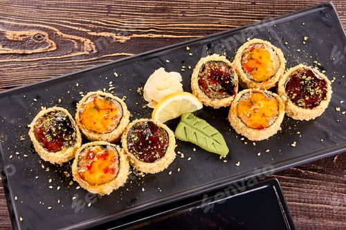 Preview: Top closeup view on sushi rolls.