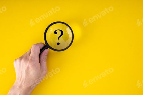 Preview: Magnifying glass with QUESTION MARK in focus on yellow background