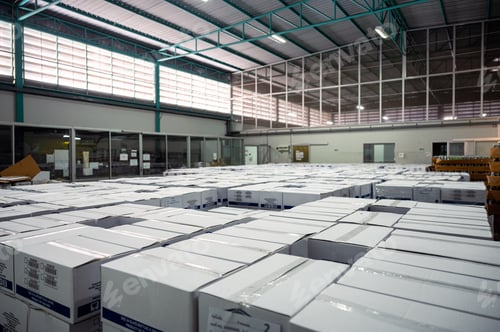 Preview: Products packed in cardboard box at warehouse