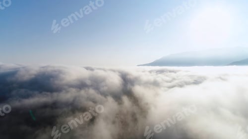 Preview: Beautiful endless heaven, bright sun and blue, clear sky. Shot. Breathtaking view of white clouds