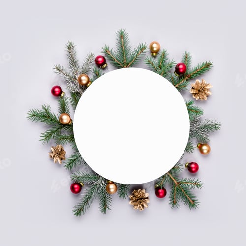 Preview: Christmas frame from natural fir branches and colorful balls on gray background