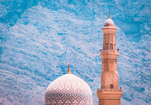 Preview: Beautiful white mosque in the mountains in Khasab, Oman