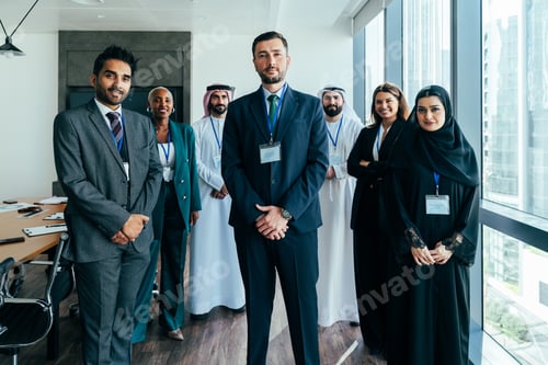Preview: Multiethnic business team collaborating in corporate office conference in dubai