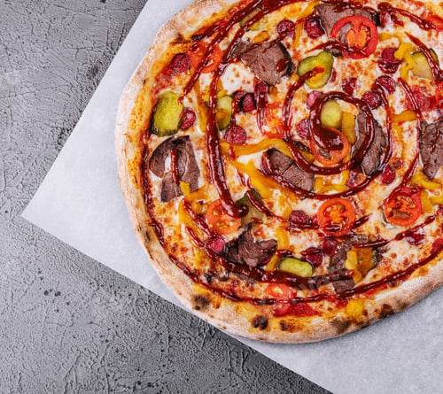 Preview: Italian pizza with sausage, meat and cucumbers