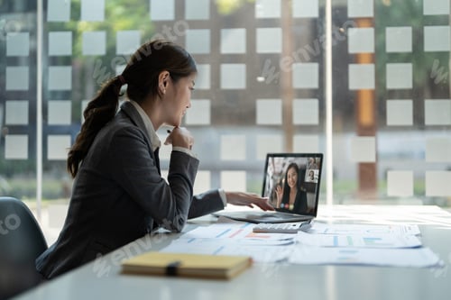 Preview: business woman talking to her colleagues about plan in video conference. Multiethnic business team
