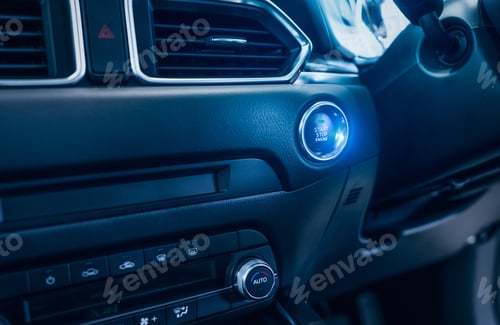 Preview: Start stop engine button of luxury car. Push up button for start or stop car engine in keyless