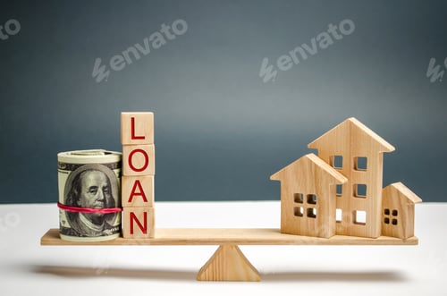 Preview: Miniature wooden house, dollars and the inscription Loan on the scales