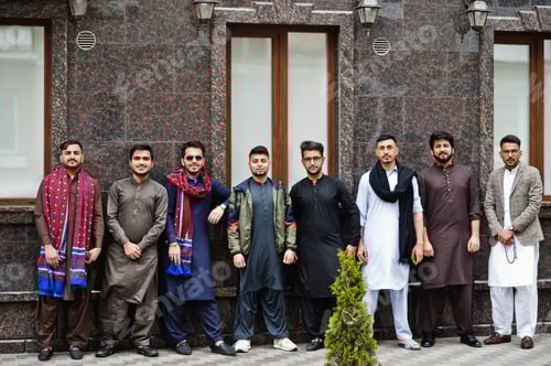 Preview: Group of Young Men Posing in Urban Setting