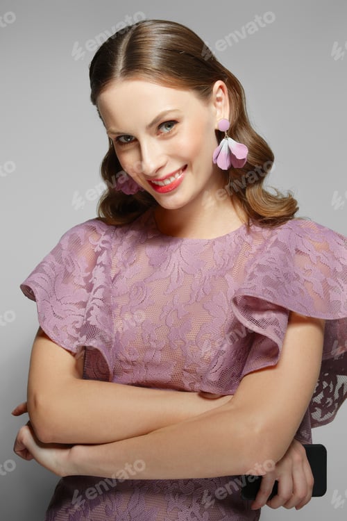 Preview: Beautiful fashion model in lilac lace. dress. Clean fresh face of pretty girl with natural makeup.