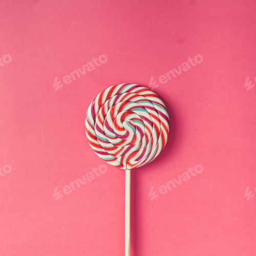 Preview: Colorful lollipop on pink background.