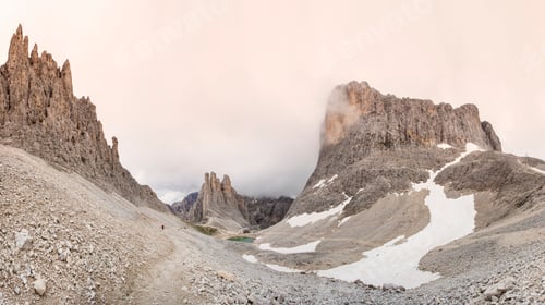 Preview: Low clouds over rock formations, Dolomites, Italy