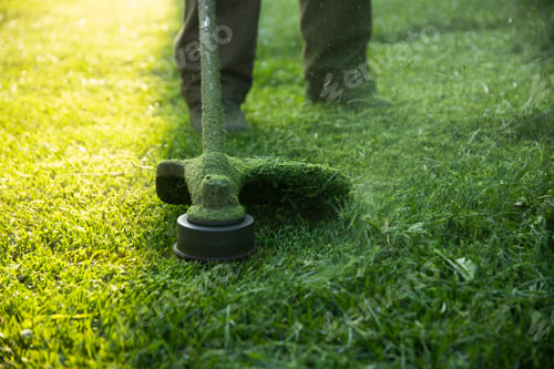 Preview: Lawn mover on green grass. Machine for cutting lawns.