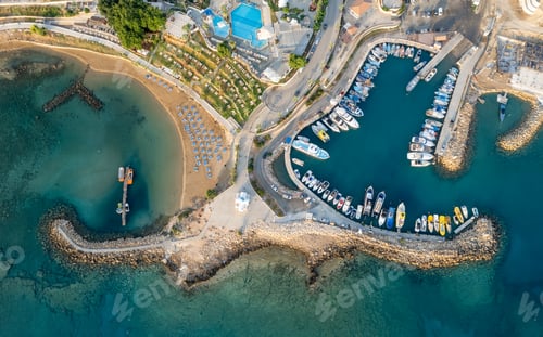 Preview: Drone aerial scenery fishing port at pernera Protaras Cyprus. Fishing boats moored in the harbour