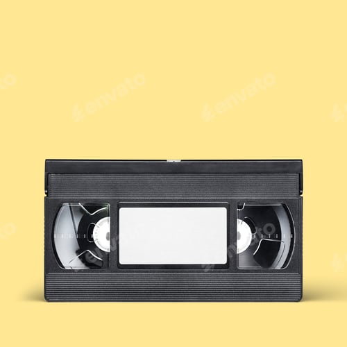 Preview: VHS video tape cassette on yellow background