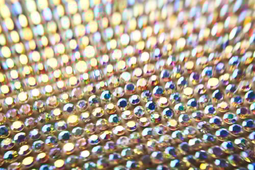Preview: Abstract background made of rhinestones shimmering in the light.