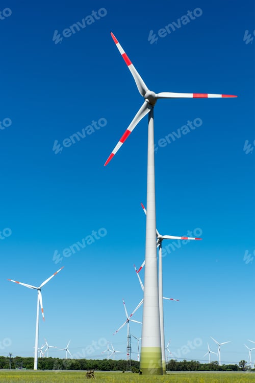 Preview: Windwheels in front of a blue sky