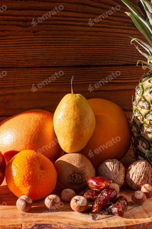Preview: Tropical fruits and nuts vegan diet. Pineapple, grapefruit, orange, pear, walnuts weight loss foods