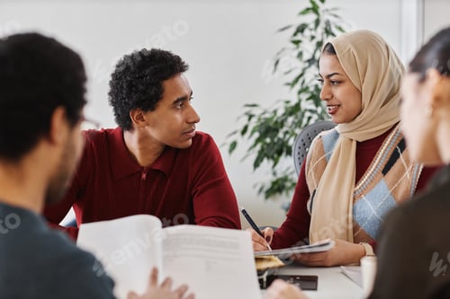 Preview: Group of Middle Eastern business people working together