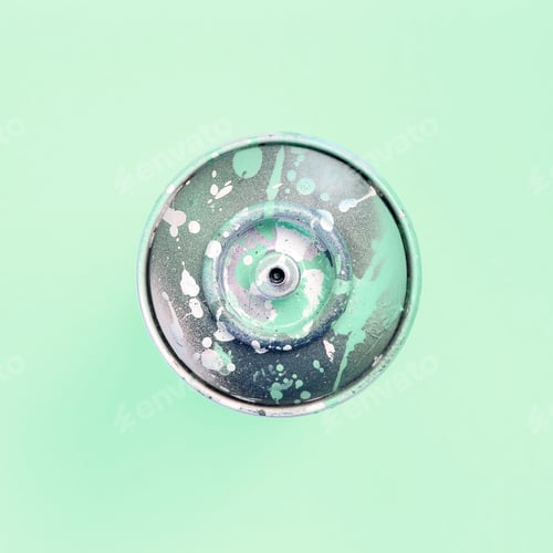 Preview: Single used spray can for graffiti drawing lies on a pastel colored backgrou