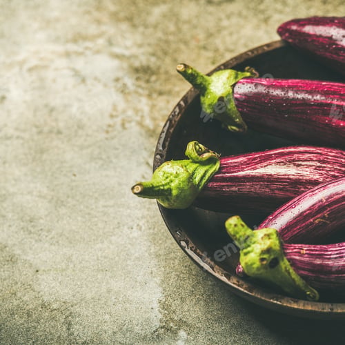 Preview: Fresh raw Fall harvest purple eggplants, copy space