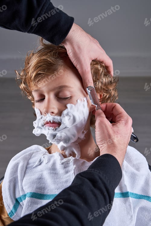 Preview: Boy shaving in a barbershop