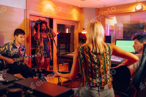 Preview: Alternative band recording a track in a music studio.
