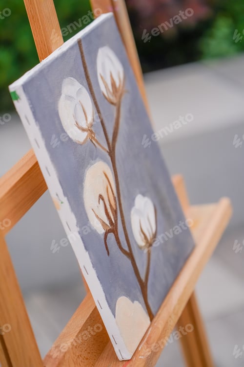 Preview: A close-up of painting standing on an easel in a studio for painting the concept of love of fine art