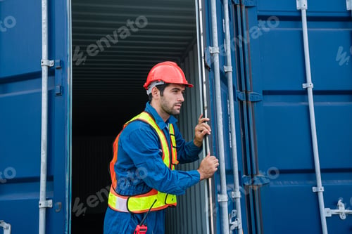Preview: Male Container yard worker control and checking container.