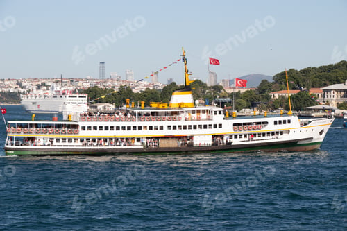 Preview: Big white ship sailing near a pear with Turkey's flags