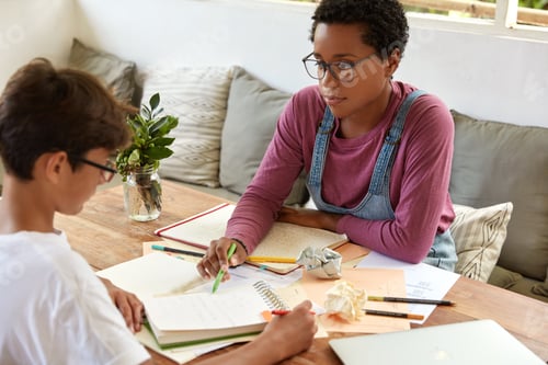 Preview: Tutoring, education and encouragement concept. Serious black female tutor conducts geometry class wi